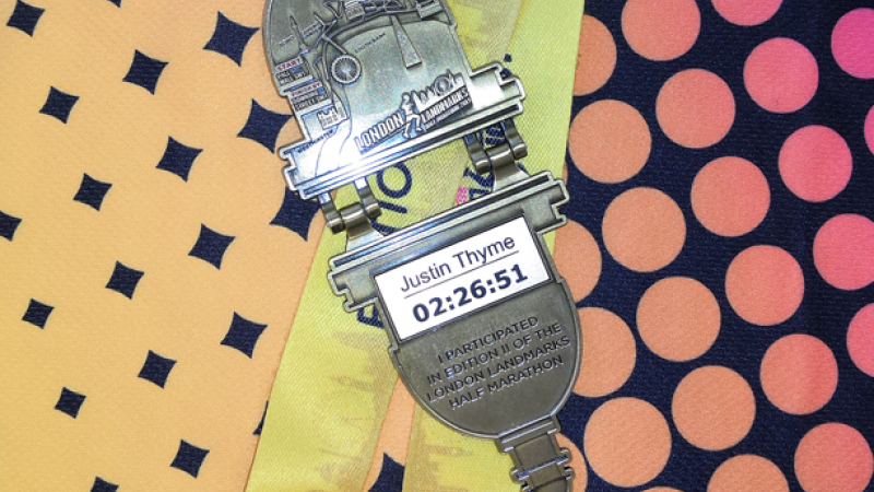 A London Landmarks Half Marathon 2019 medal complete with iTAB